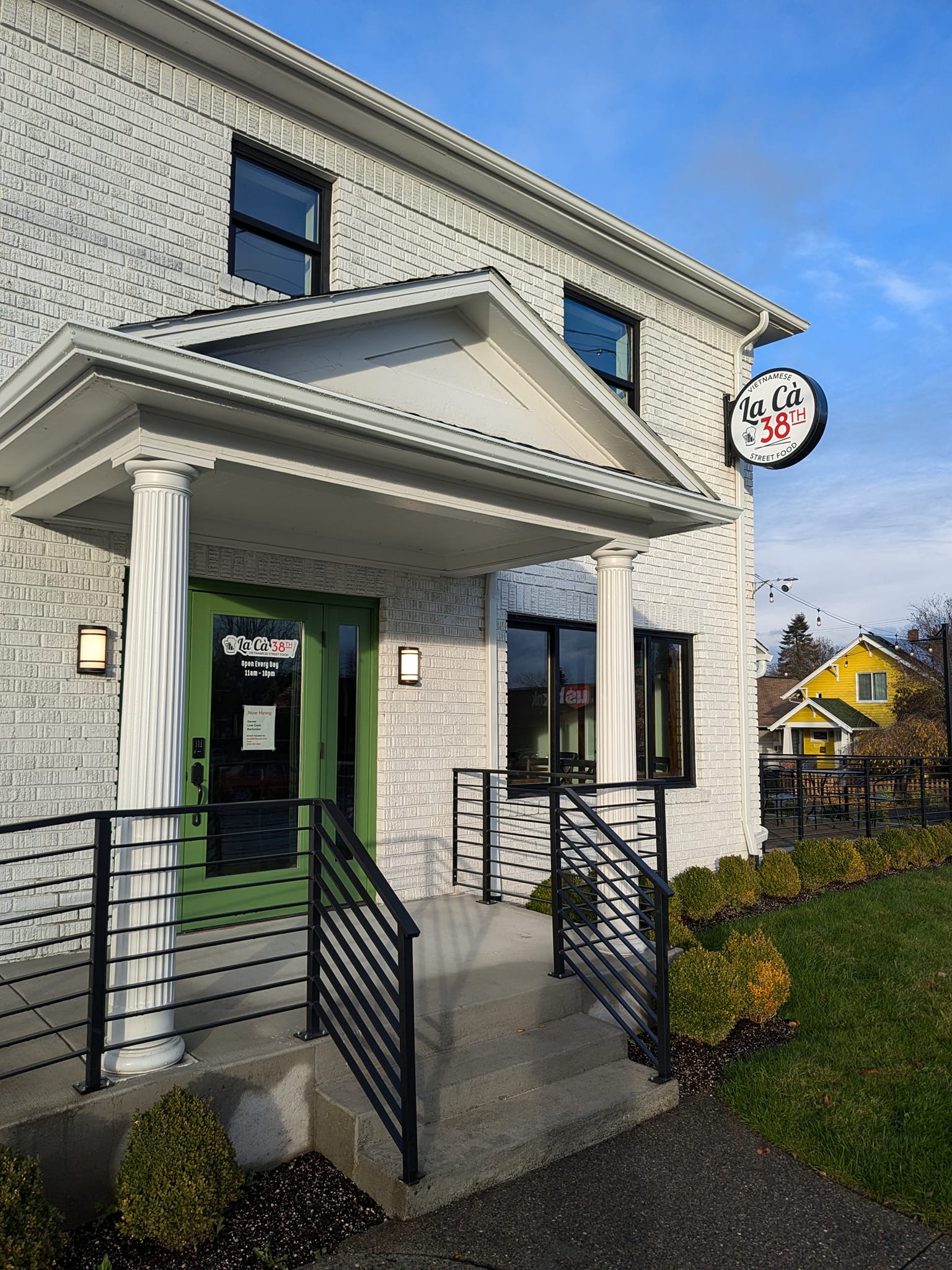 Elegant exterior of La Cà 38th authentic Vietnamese bistro with classical architecture and refined design in Tacoma's 38th Street district